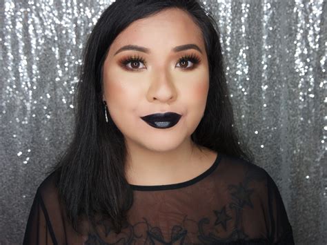 Celestial Vibes: Embracing the Darkly Divine with Black Magic Lipstick